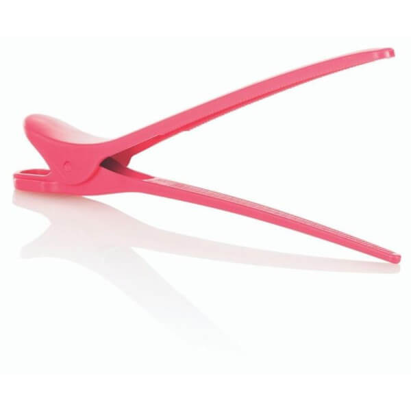 Zes grote roze plastic clips. Zes grote roze plastic clips.