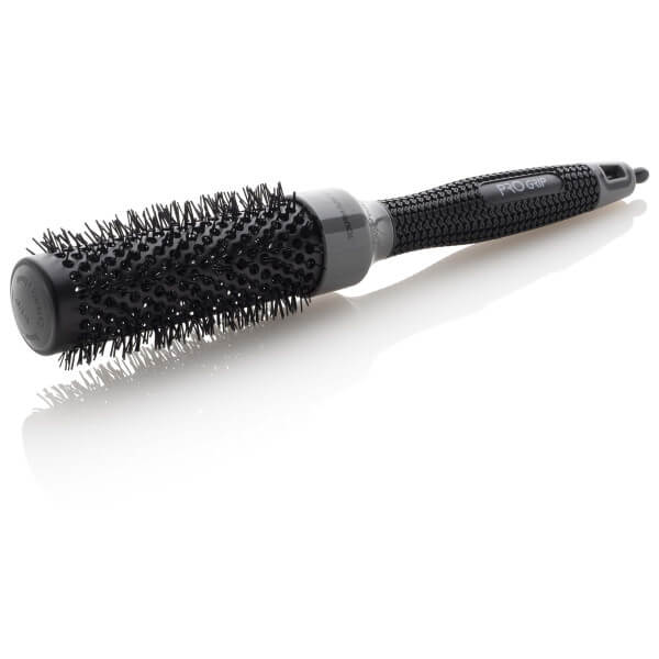 Escova térmica de turmalina com punho de 32mm de diâmetro. Escova térmica de turmalina com punho de 32mm de diâmetro.