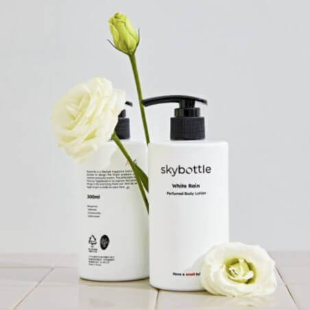 White rain Skybottle duftende Körperlotion mit Tuberose und Geißblatt 300g