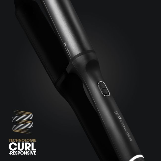 Boucleur ghd chronos curve max wand se traduce como "Rizador ghd chronos curve max" en español.