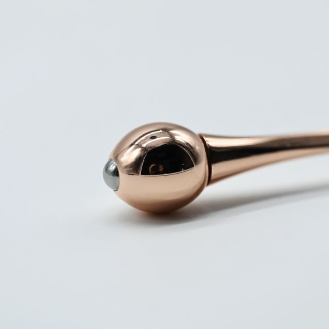 Applicateur Crème Roll'on Rose gold YUMI Skincare